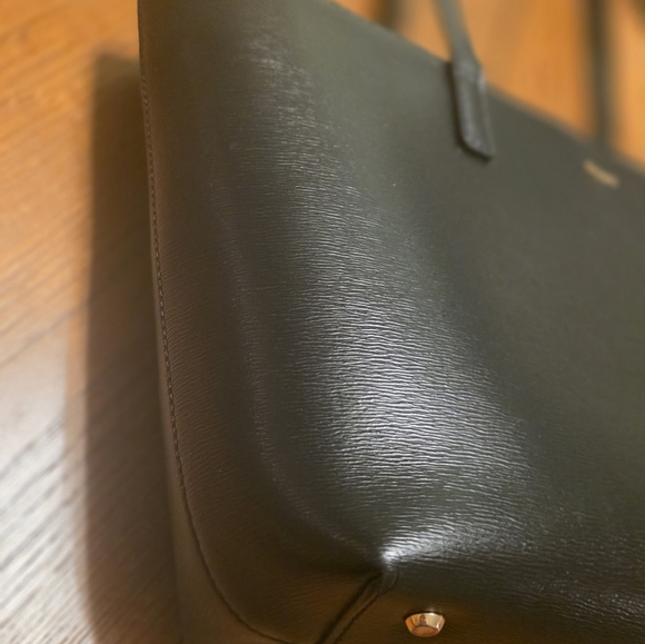 DKNY Bryant Medium Zippered Tote Bag in black leather with gold-tone hardware.  - Picture 11 of 17